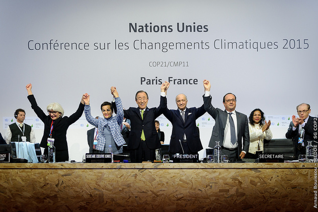 World leaders rejoicing at the adoption of the Paris Agreement (PHOTO: UNFCCC)