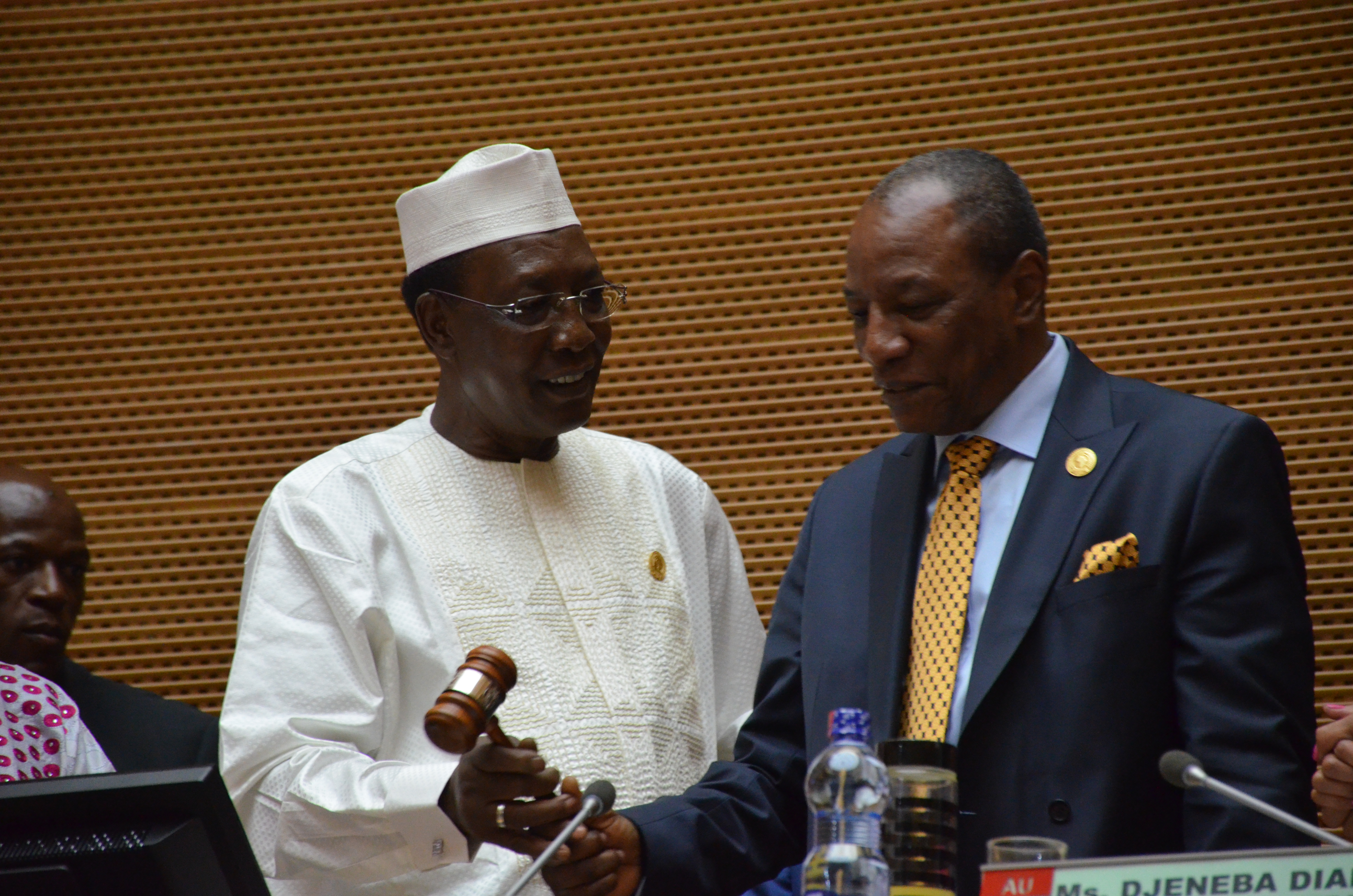 President Conde receiving the instrument of office as AU Chairperson from President Idris Derby