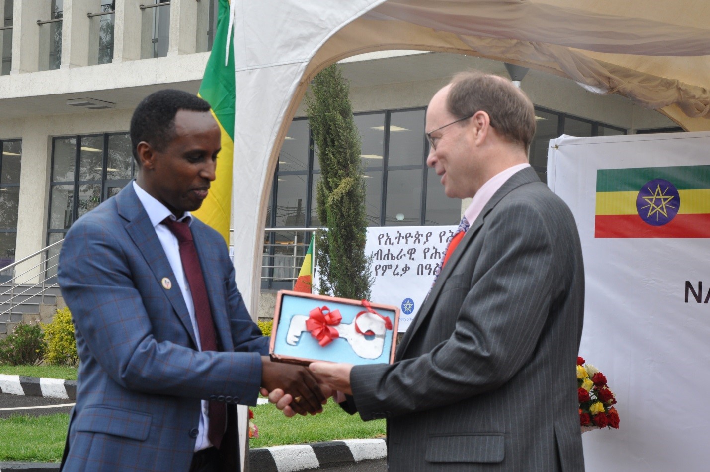 Dr. Ebba Abate, Director General of EPHI receiving the key of the National Public Health Training Center.