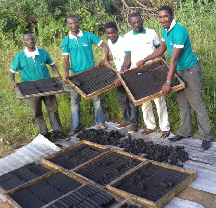 Cameroonian youths producing charcoal from household waste (PHOTO: ClimateReporters/Elias Ntungwe)