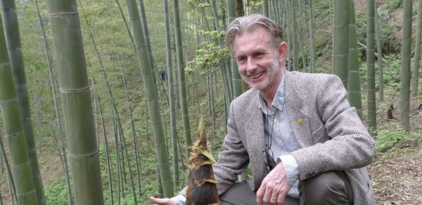 NBAR Director General Hans Friederich is pictured among bamboo plants. (PHOTO: International Bamboo and Rattan Organisation)