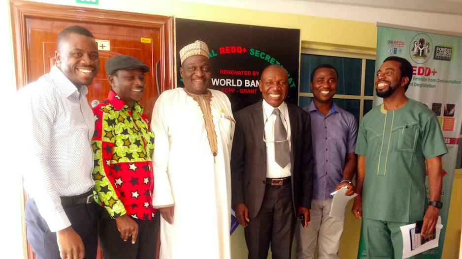 Dr Moses Modey Ama, Nigeria's REDD+ Coordinator standing in the middle with Dr Ibrahim Choji, Chair CSDevNet's Board of Trustees (PHOTO: CSDevNe)