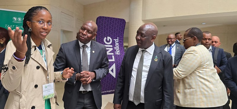 TAAT’s Marie-Michele Codja with Hon Mofusi and Hon Thabo Moleko during the visit o the TAAT booth